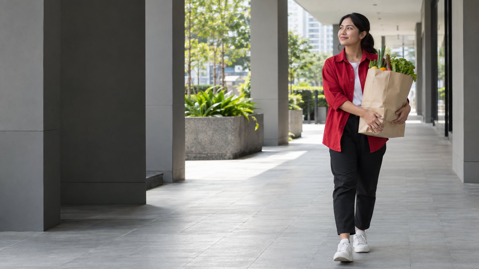 Illustrative scene of a woman carrying groceries along a contemporary Malaysian residential walkway.